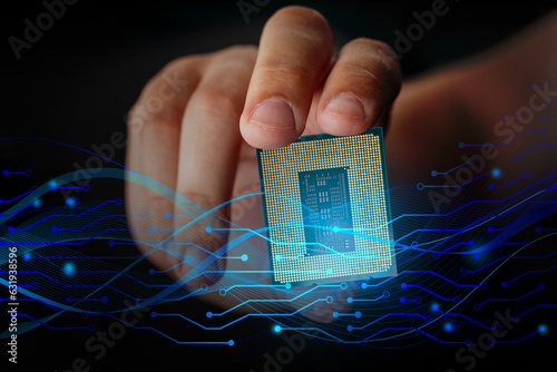 CPU from contact side in hand and symbolic graphic waves and contact printed tracks for presentations, teaching materials. Computer technology, architecture, electronics. High-performance processing photo
