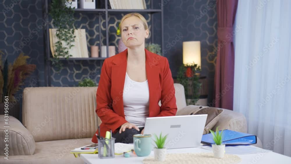 Home office worker woman looking at camera curious and confused. Home office worker woman looking at camera curious and confused.