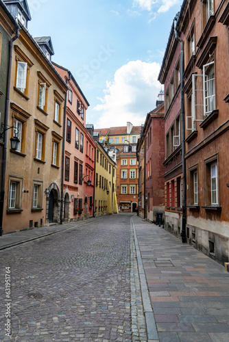 Fototapeta Naklejka Na Ścianę i Meble -  View of the cobblestone streets at the Old Town Market Square in Warsaw, Poland
