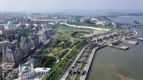 Aerial view of historical districts of Kazan on bank of Volga River overlooking ancient Kremlin on sunny summer day, Republic of Tatarstan, Russia