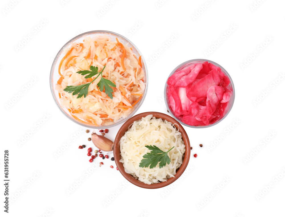 Delicious sauerkraut prepared according to different recipes and spices on white background, top view Delicious sauerkraut prepared according to different recipes and spices on white background, top view
