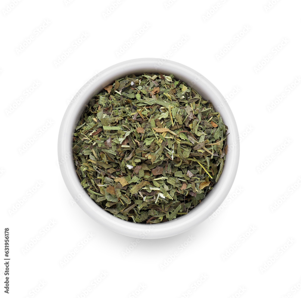 Bowl of dry tarragon isolated on white, top view Bowl of dry tarragon isolated on white, top view