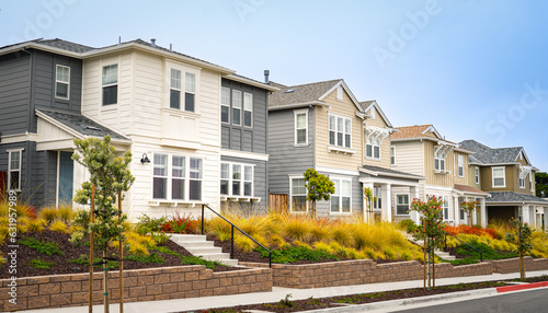 Single family homes in a row with steps in front