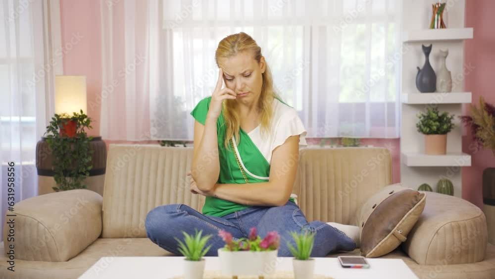 The grieving woman is thinking and suffering from depression. The grieving woman is thinking and suffering from depression.