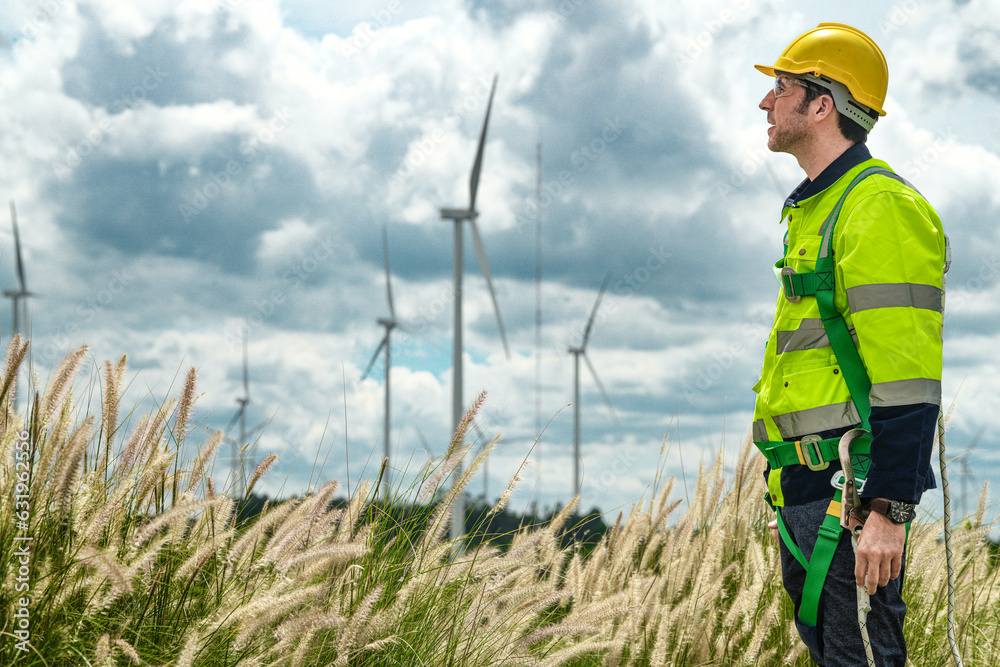 engineer working in fieldwork outdoor. Technicians of wind turbine