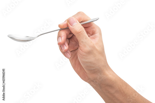 isolated of a man's hand holding a steel spoon.
