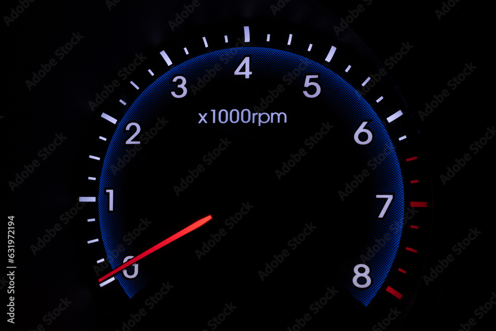 Tachometer on car with dark black background Tachometer on car with dark black background