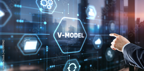 Businessman clicks V-Model, VEE. Information systems development model
