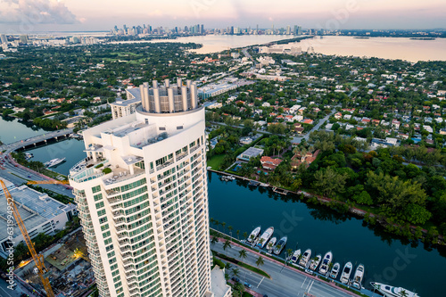 Aerial of Trésor Tower, part of Fountainbleau hotel, and Indian Creek. Brickell, downtown Miami and Biscayne Bay in the background. photo