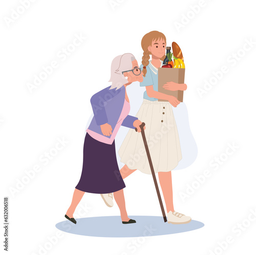 respect for pensioners concpet. Smiling Young Woman Helps Senior Grandmother Carry Grocery Bag. Smiling caring girl assist senior granny.