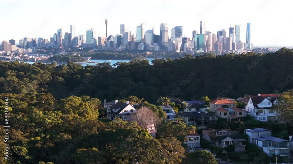 Drone aerial point of view cityscape skyline with skyscrapers office building and village community people house with sydney harbour bridge in NSW, Australia. Landmark famous place and tourism concept