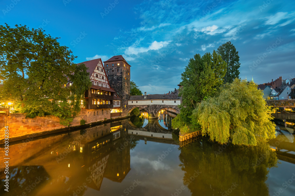Nuremberg (Nurnberg) Germany, night city skyline at Wasserturm and Pegnitz River view from Max Bridge