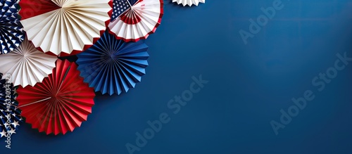 American Independence Day decorations on a blue background  displayed in a flat lay style with a top view. also copy space available.