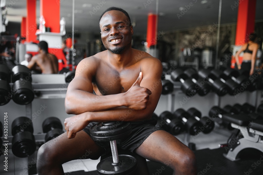 Young athletic African American man in the gym Young athletic African American man in the gym