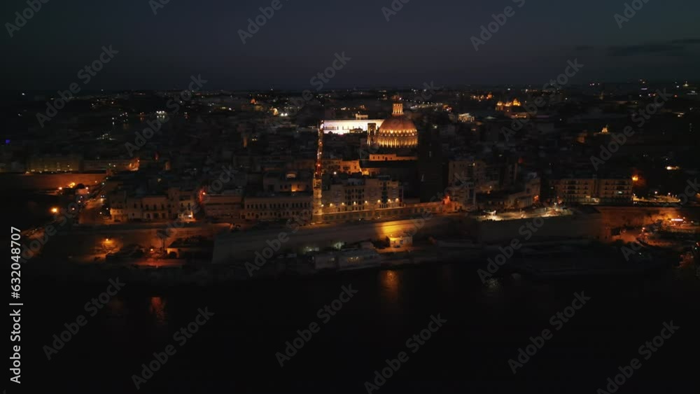 Aerial video of the city of Malta with the Saint's Cathedral in the evening Aerial video of the city of Malta with the Saint's Cathedral in the evening