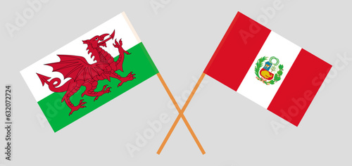 Crossed flags of Wales and Peru. Official colors. Correct proportion