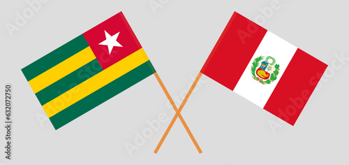 Crossed flags of Togo and Peru. Official colors. Correct proportion