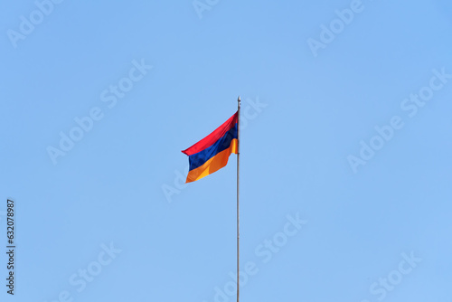 Close-up of the Armenian flag against the blue sky