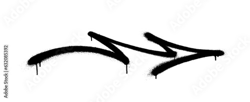 Graffiti arrow with overspray in black over white.