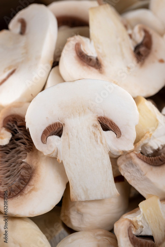 sliced mushrooms during cooking dishes with champignons