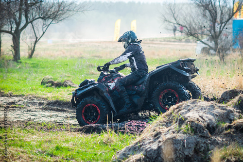 ATV, UTV, buggy, 4x4 off-road vehicle in mud and dust. Extreme, adrenalin