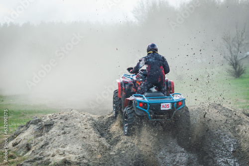 ATV and UTV offroad vehicle racing in dust. Extreme, adrenalin. 4x4