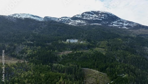 Harastolen Luster - Aerial approaching majestic mountain building with historic Tuberculosis sanatorium and mental hospital