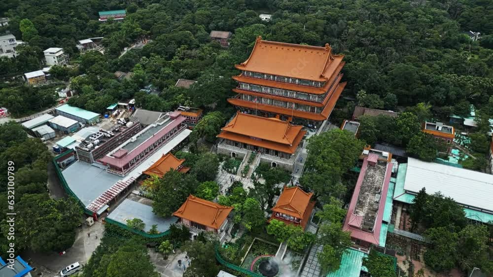 Aerial around the Po Lin Monastery on Lantau Island, Hong Kong, China. Drone orbit shot