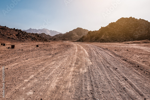 Empty dry desert under sunlight