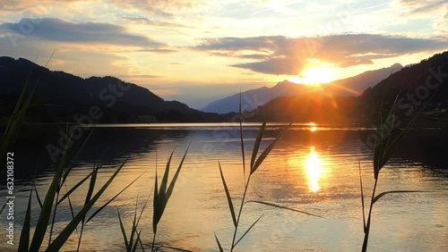 Picturesque sunset on the Weissensee mountain lake photo