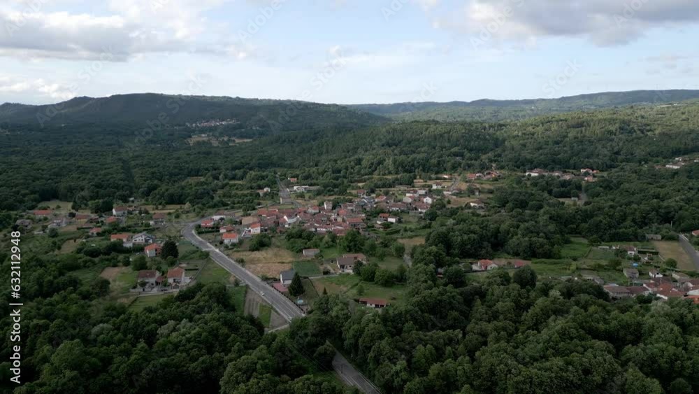 Drone dolly push in along country side road in hill town of spain Drone dolly push in along country side road in hill town of spain