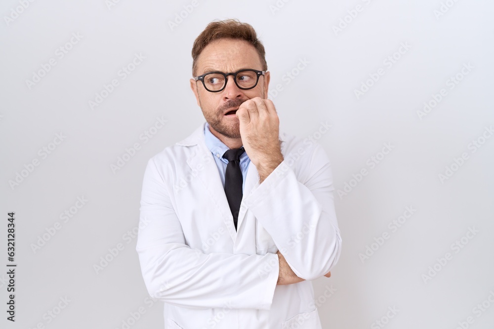 Middle age doctor man with beard wearing white coat looking stressed and nervous with hands on mouth biting nails. anxiety problem. Middle age doctor man with beard wearing white coat looking stressed and nervous with hands on mouth biting nails. anxiety problem.