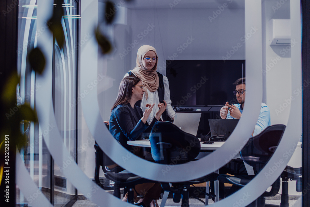 A diverse group of businessmen collaborates and tests a new virtual ...
