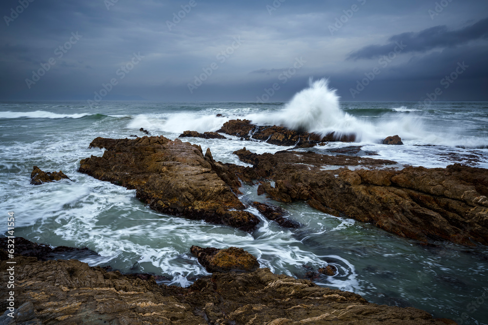 Rough seas and stormy skies as a winter cold front moves past Hermanus, Whale Coast, Overberg, Western Cape, South Africa.