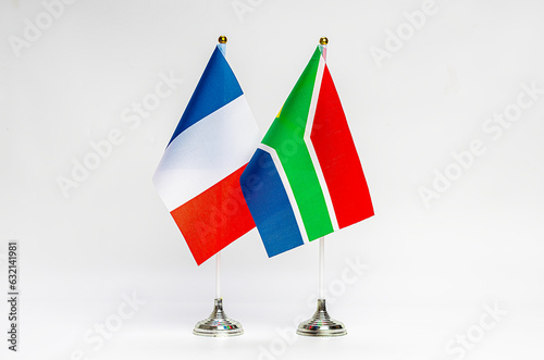 State flags of France and South Africa on a light background. photo