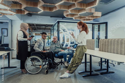 Young group of business people brainstorming together in a startup space, discussing business projects, investments, and solving challenges.