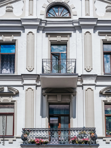 Kaunas, Lithuania - 07 26 2023: Beautiful balconies of an old house in the center of Kaunas photo