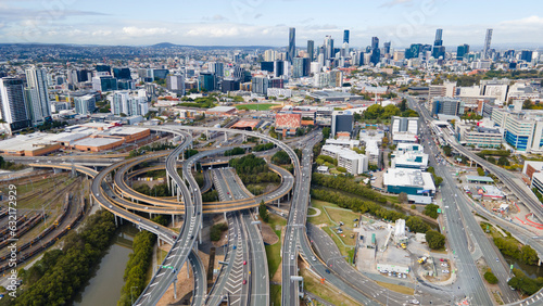 Aerial drone view of the Bowens Hill Interchange in Bowen Hills, Brisbane, Queensland Australia showing Brisbane City cbd in the background 