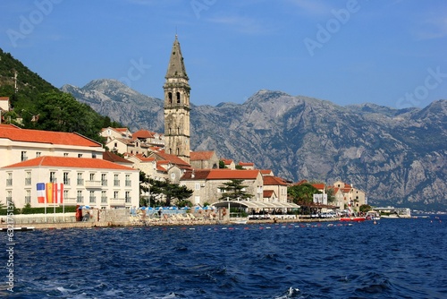 Wallpaper Mural Brown cones on spruce branches on a sunny summer day, Mediterranean plants. A branch of a pine tree with green needles and a pine cone against the blue sky Torontodigital.ca
