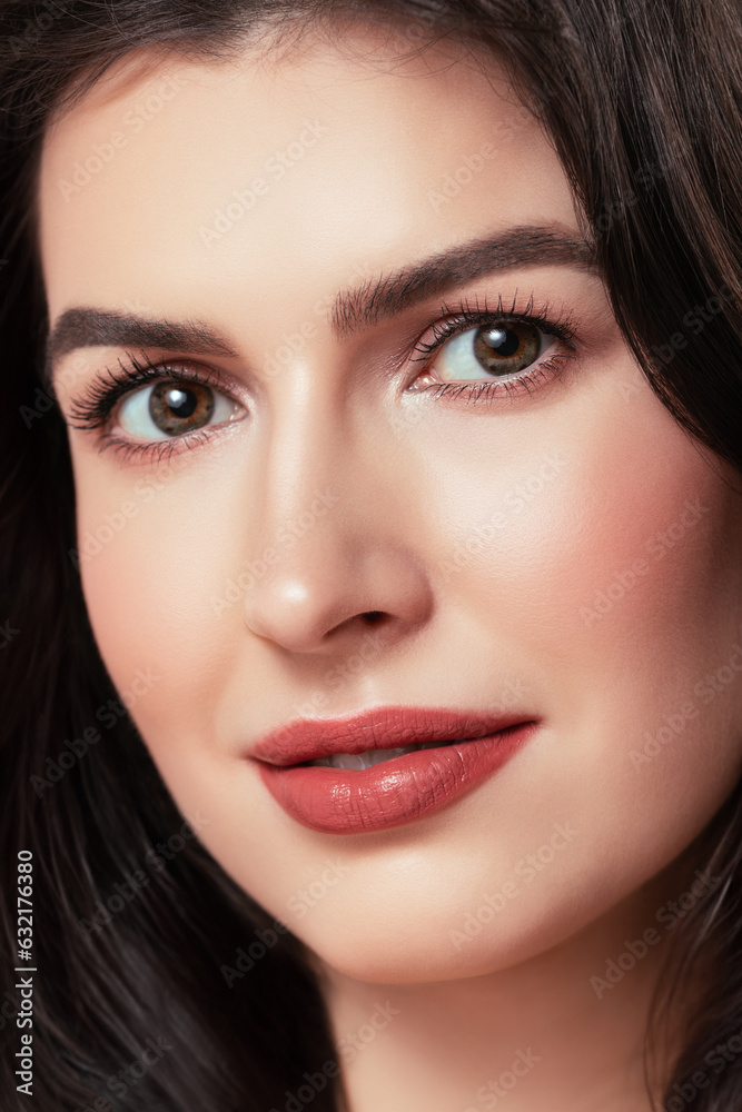 Portrait beautiful young woman looking at camera and smiling. Face attractive caucasian brunette woman close up. Cosmetology, beauty and spa concept Portrait beautiful young woman looking at camera and smiling. Face attractive caucasian brunette woman close up. Cosmetology, beauty and spa concept