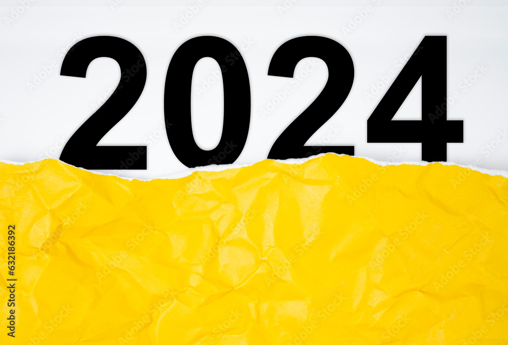 The 2024 number inside yellow paper torn. Preparation 2024 year ...