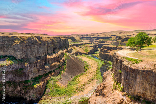 desert canyon with a colorful sky located at Palouse Falls in eastern Washington