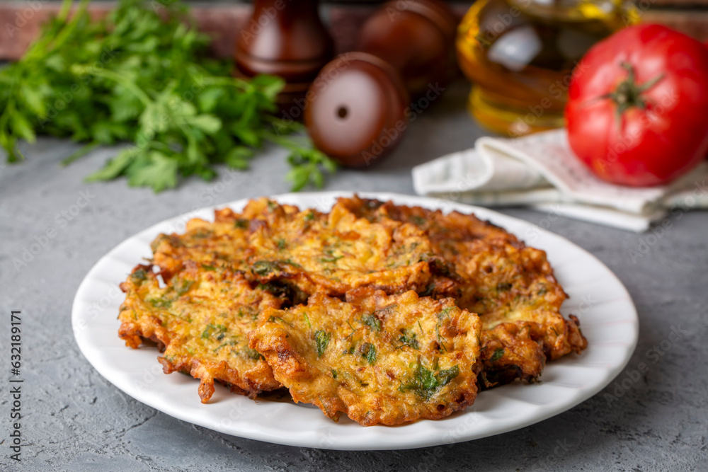 Mucver, Turkish traditional food. (Turkish cuisine) Homemade Food with Zucchini. Mucver, Turkish traditional food. (Turkish cuisine) Homemade Food with Zucchini.