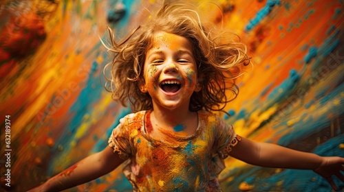 Little young girl playing with colors at elementary schools.