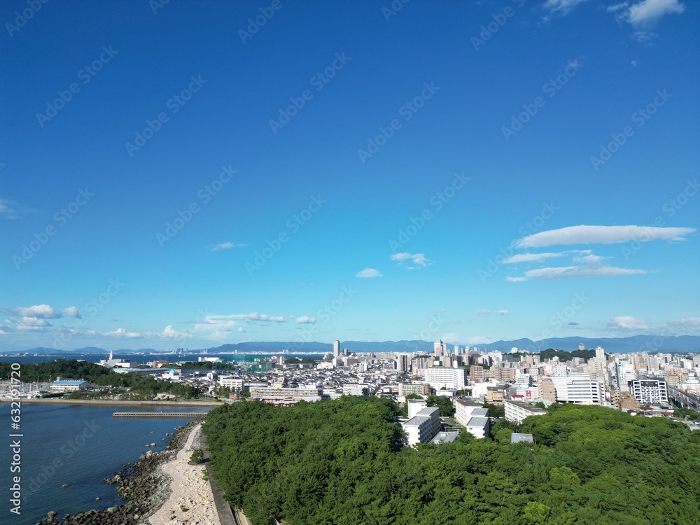 [Drone] Looking at the cityscape of Fukuoka from the summer coast