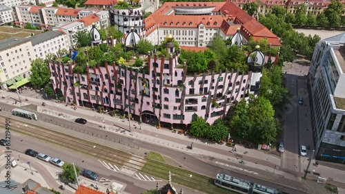 Aerial Drone shot of the Green Citadel (Grüne Zitadelle) by Friedensreich Hundertwassers in Magdeburg city, Saxony-Anhalt, Germany . photo