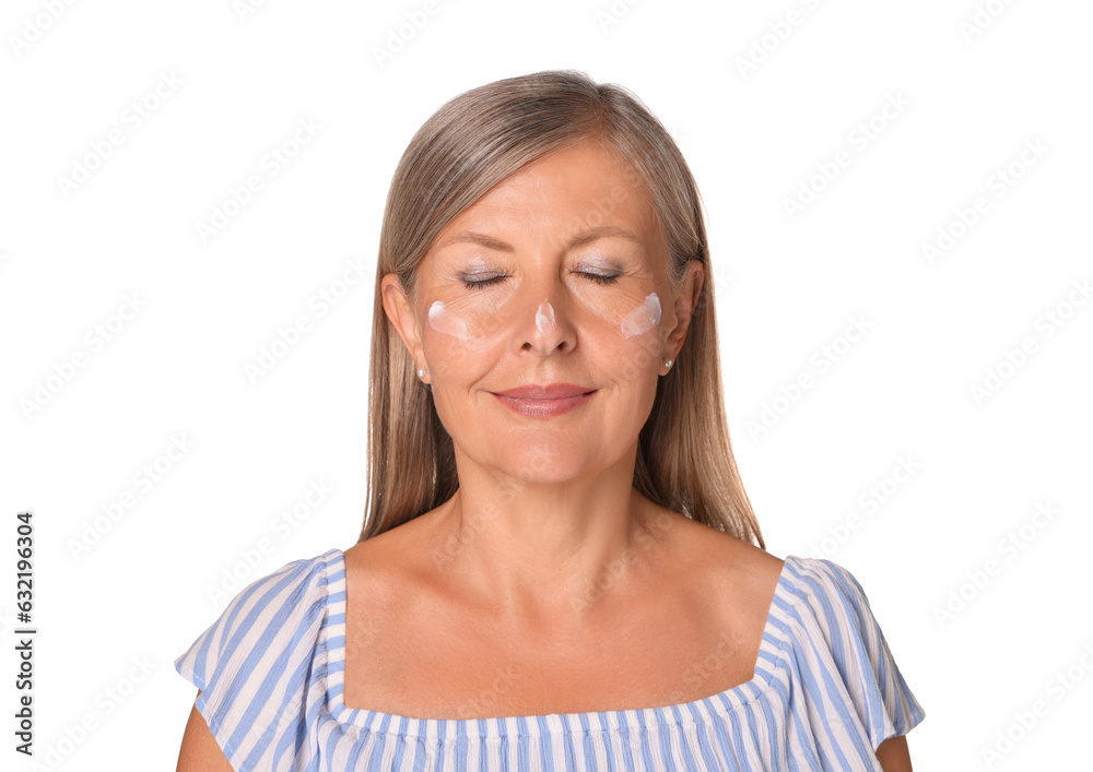 Beautiful senior woman with sun protection cream on her face isolated on white Beautiful senior woman with sun protection cream on her face isolated on white