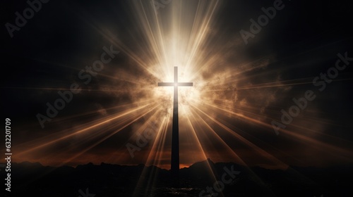 silhouette of a Cross, background of crepusular rays photo
