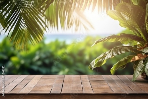 Wooden table with tropical leaves and blurred background of beach and sun light. ready for product display. generative ai © LivroomStudio