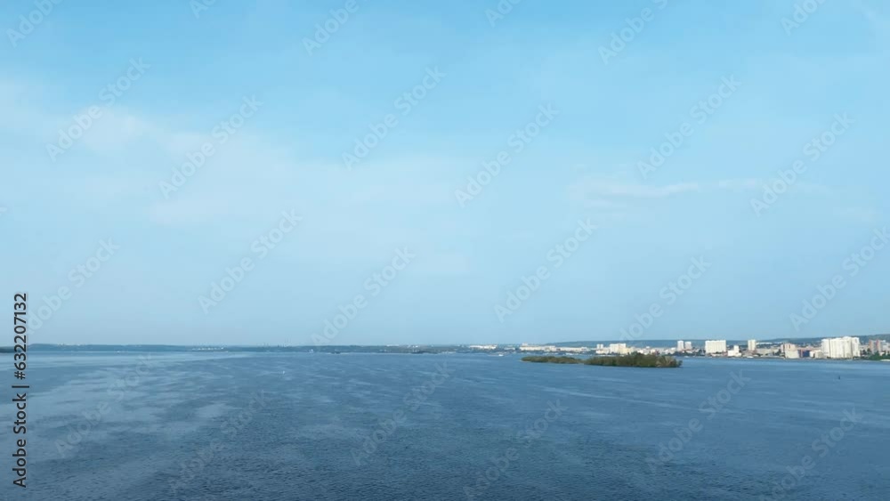 drone movement along a wide river in summer. aerial shooting drone movement along a wide river in summer. aerial shooting